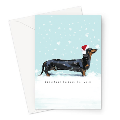 Dachshund Through The Snow Greeting Card | Funny Sausage Dog In A Santa Hat For Dog Lover, Owner, Dasher, Dachshund Stood In Snow With Snowfall
